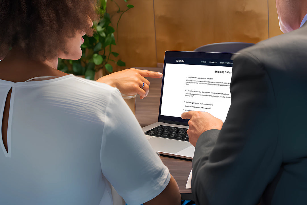 Techify™ support team collaboratively answering customer questions during a laptop-based help session